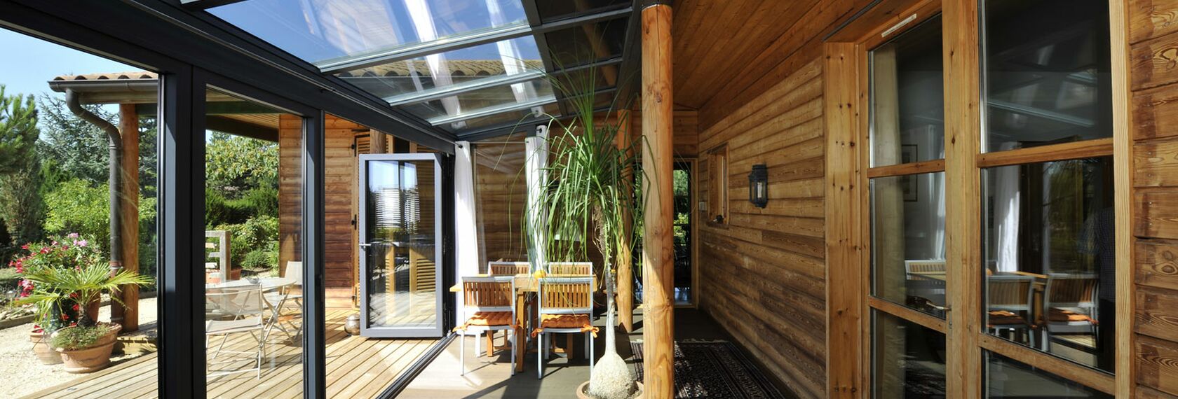 Interior view of a ThermoRoof 200 conservatory solution, featured in a French private home.